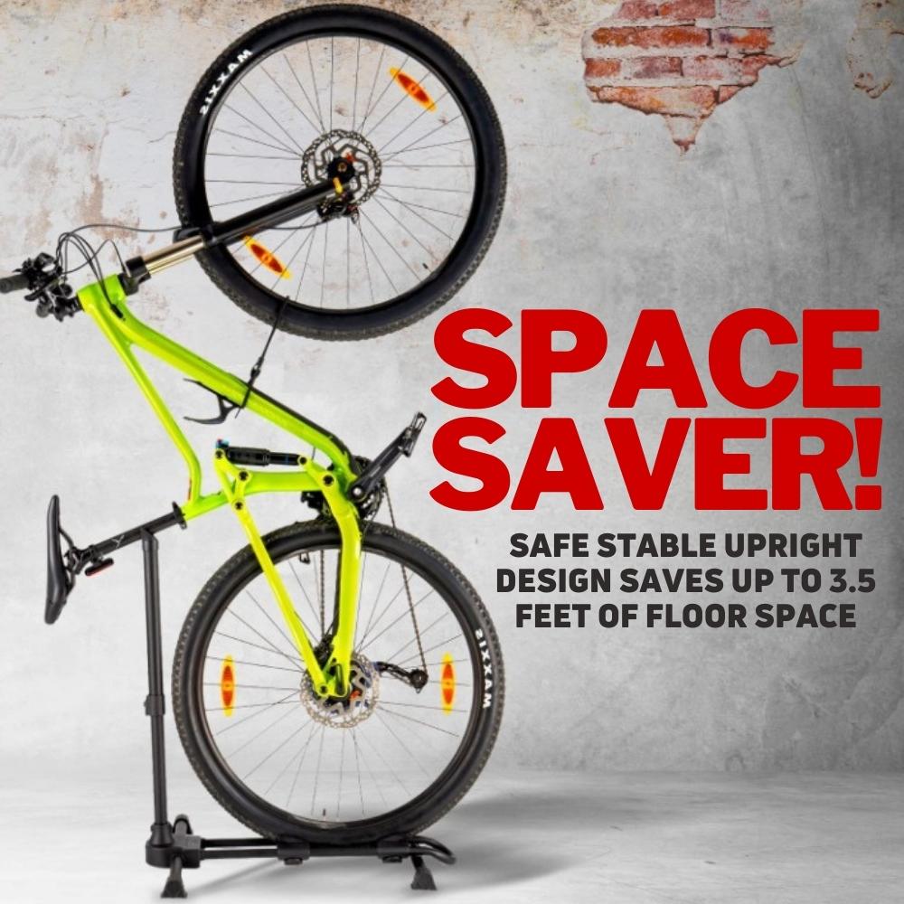 A bike held upright in a floor stand in a small indoor space