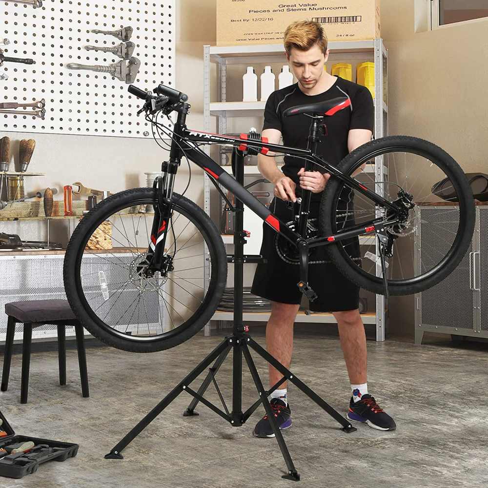 A bike clamped in a repair stand at working height