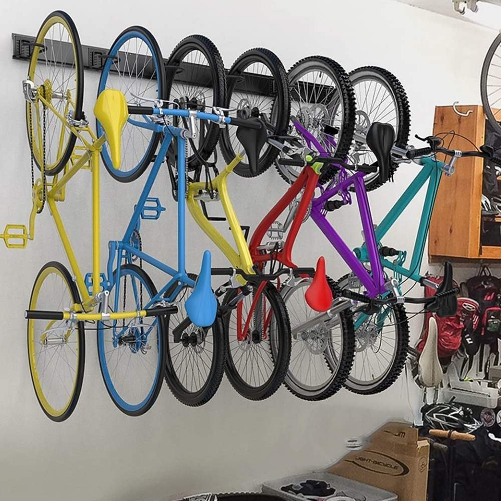 Bikes hanging vertically from a wall rack