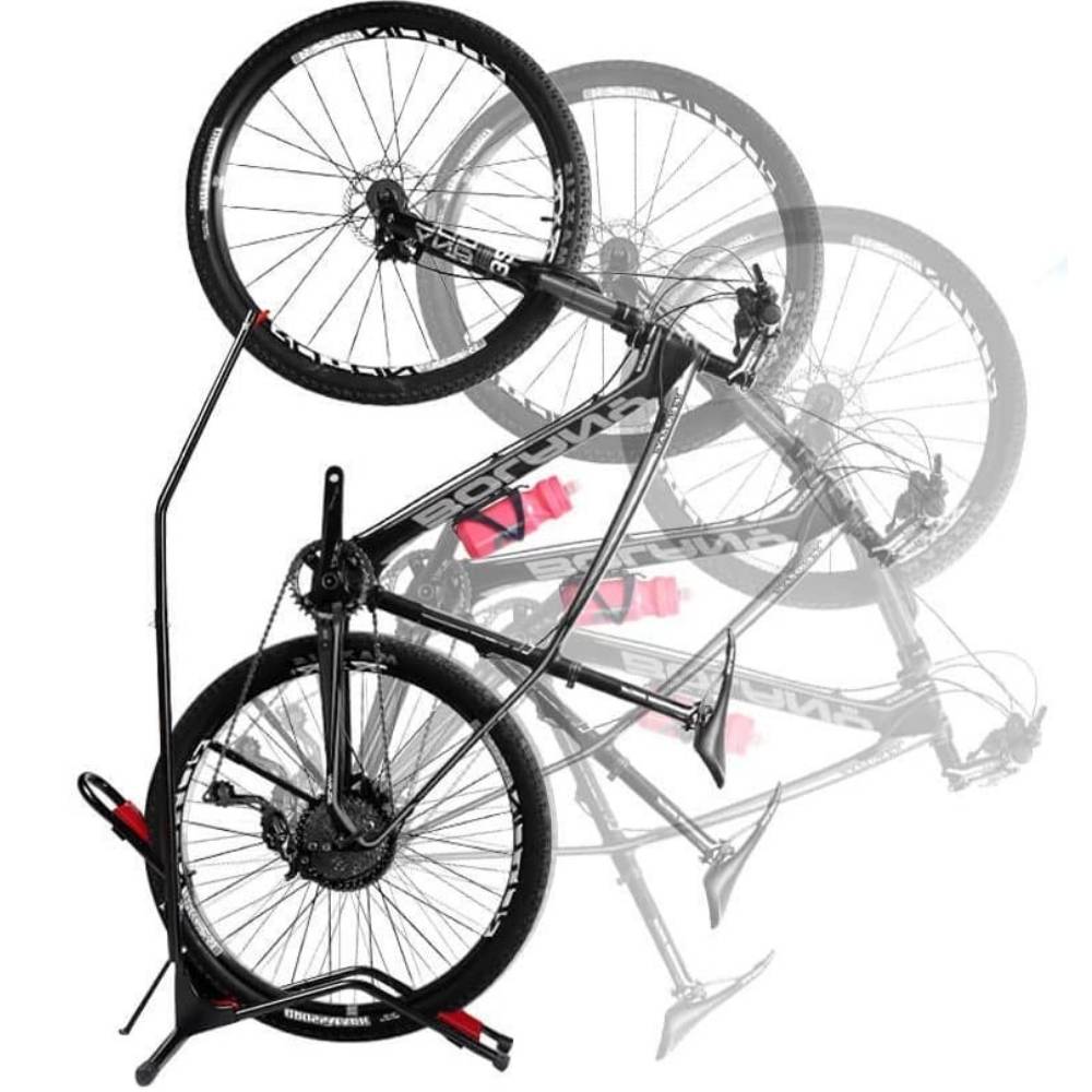 A bike standing upright on its rear wheel in a vertical bike rack