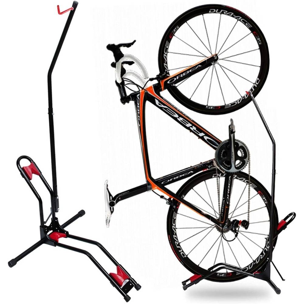 A road bike standing on its end in the vertical bike rack, rear wheel in the floor tray